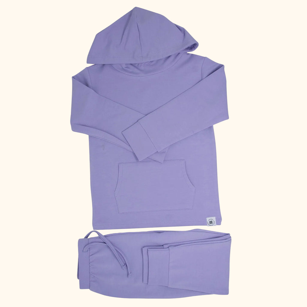 Orchid purple hooded top with kangaroo pocket and matching kids jogger pants, flat lay front view