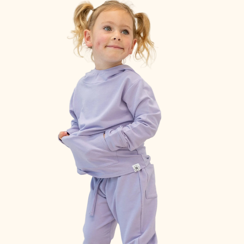 Orchid purple kids hooded pocket jogger set with matching pants, front lifestyle view