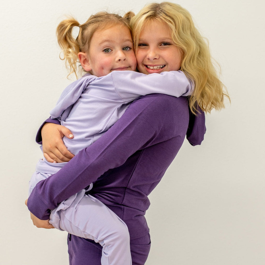 Orchid purple kids hooded jogger set with matching pants, group lifestyle view