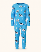 Bright blue kids cow and moon print bamboo pajama set with long sleeves and matching pants, front product view