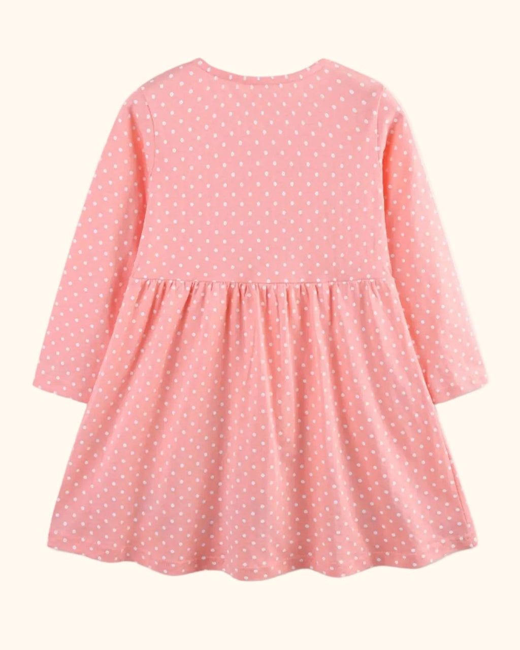 Pale blush kids polka dot long sleeve dress with gathered skirt, back product view