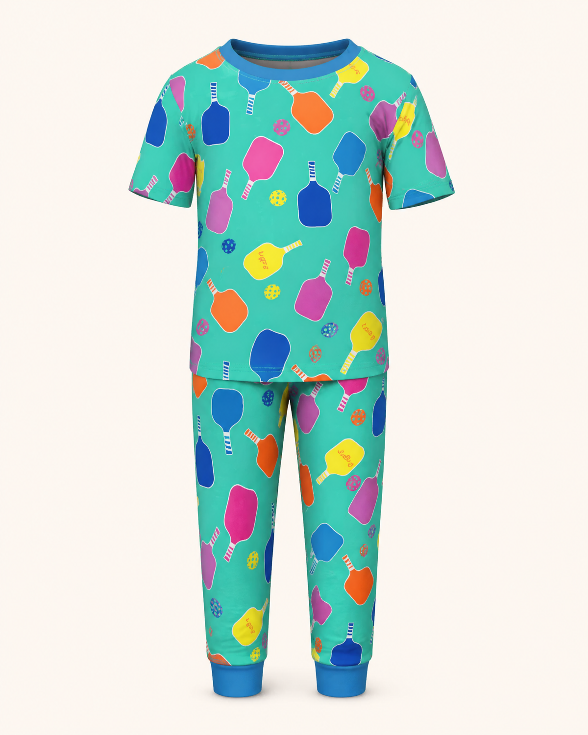 Aqua kids pickleball pajama set with short-sleeve top, long pants and blue contrast cuffs, front product view