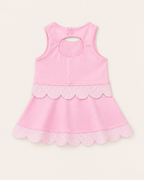 Pink kids daisy scalloped active top and skort set with back keyhole, rear product view