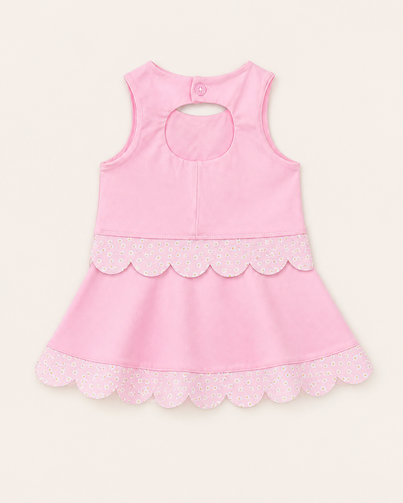 Pink kids daisy scalloped active top and skort set with back keyhole, rear product view