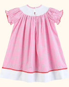 Pink gingham ABC school bishop dress with gathered back silhouette, back view
