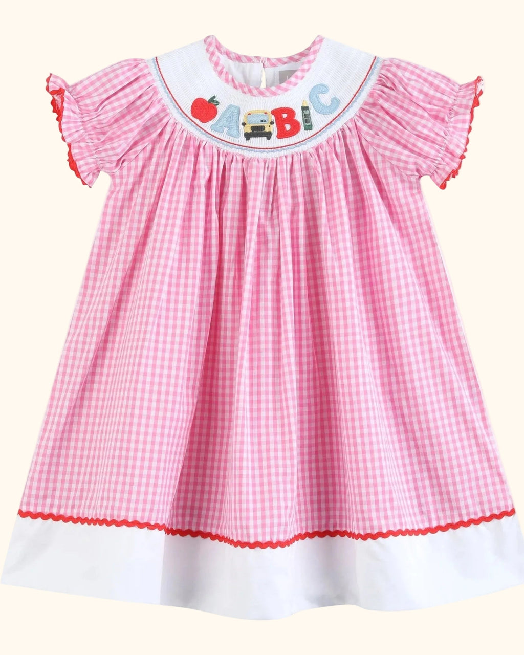 Pink gingham ABC school dress with white contrast hem band, full front view