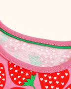 Pink kids strawberry print dress with round neckline and green inner trim, neckline close-up