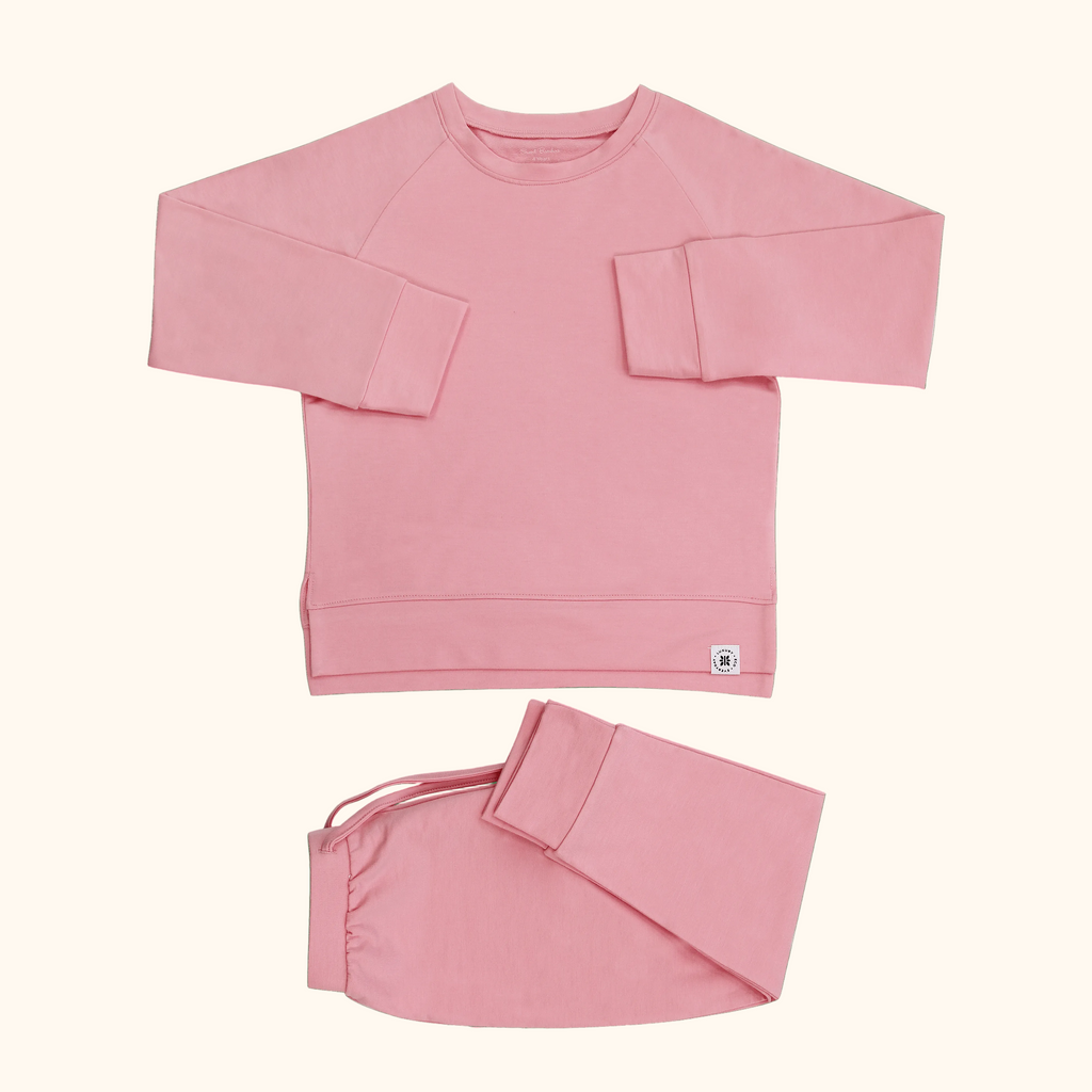 Peony pink kids crew neck top and cuffed jogger pants, flat lay view