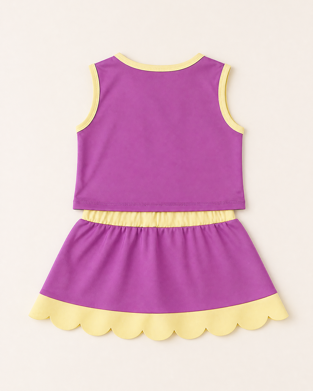 Purple kids active tank and scalloped skort set with pale yellow trim, back product view