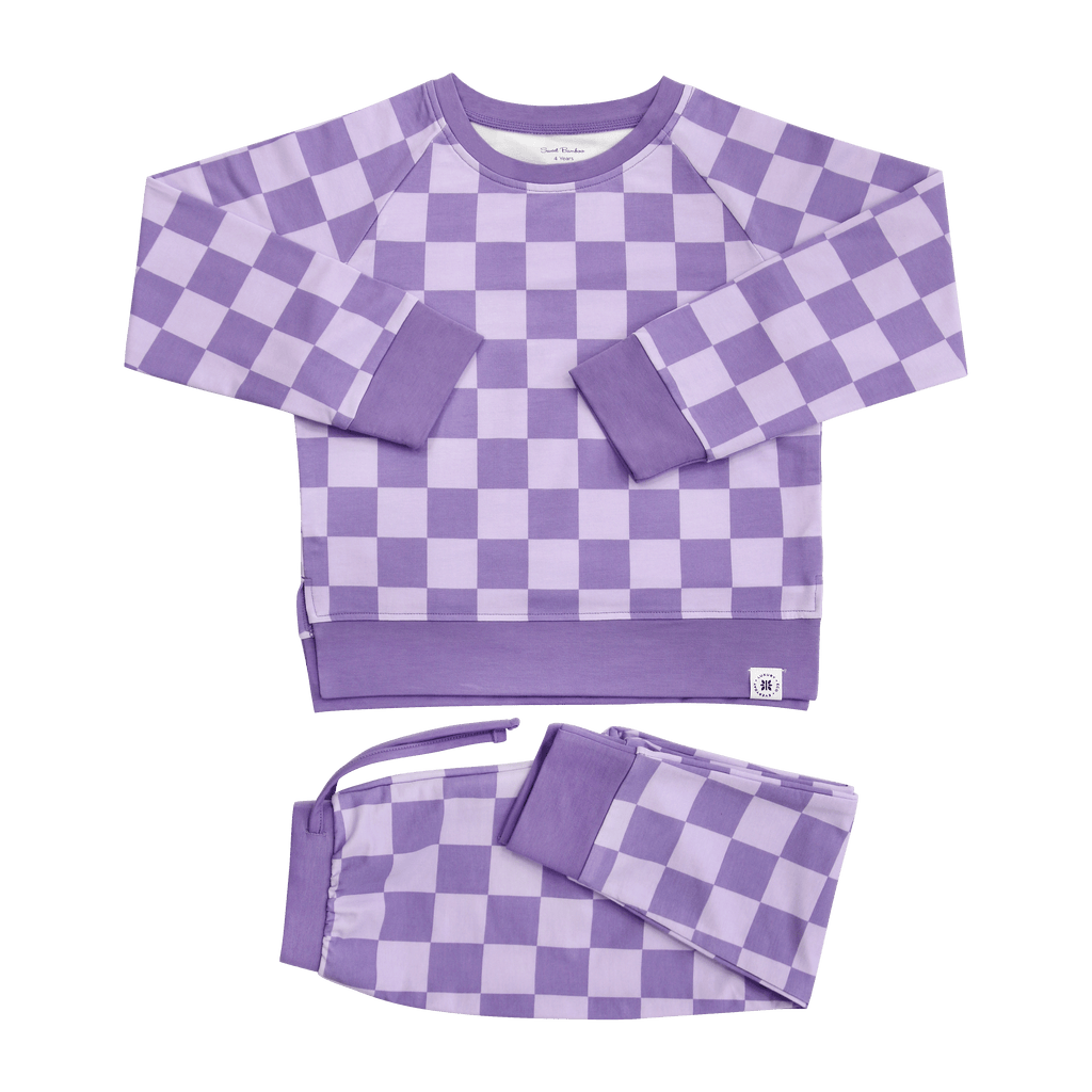 Purple Haze checker crew neck top and matching kids jogger pants, flat lay front view