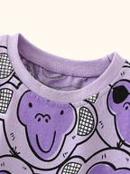 Purple kids monkey print T-shirt with lavender round neckline, neckline close-up