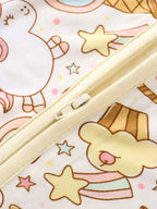 Cream baby bamboo romper with double zipper and unicorn snack print, zipper close-up