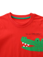 Red kids T-shirt with green crocodile graphic and round neckline, front close-up view