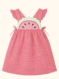 Red gingham kids dress with watermelon appliqué and ruffled straps, front product view