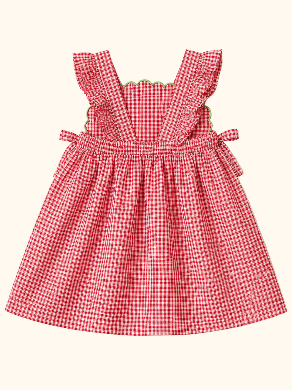 Red gingham watermelon ruffle dress with side ties and elasticized back, rear product view