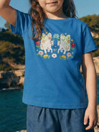 Royal blue kids unicorn and floral appliqué T-shirt worn by child, front lifestyle view