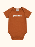 Rust brown baby organic cotton bodysuit with white peanut graphic and envelope neckline, front product view