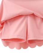 Pink active skort with built-in shorts, underside detail view