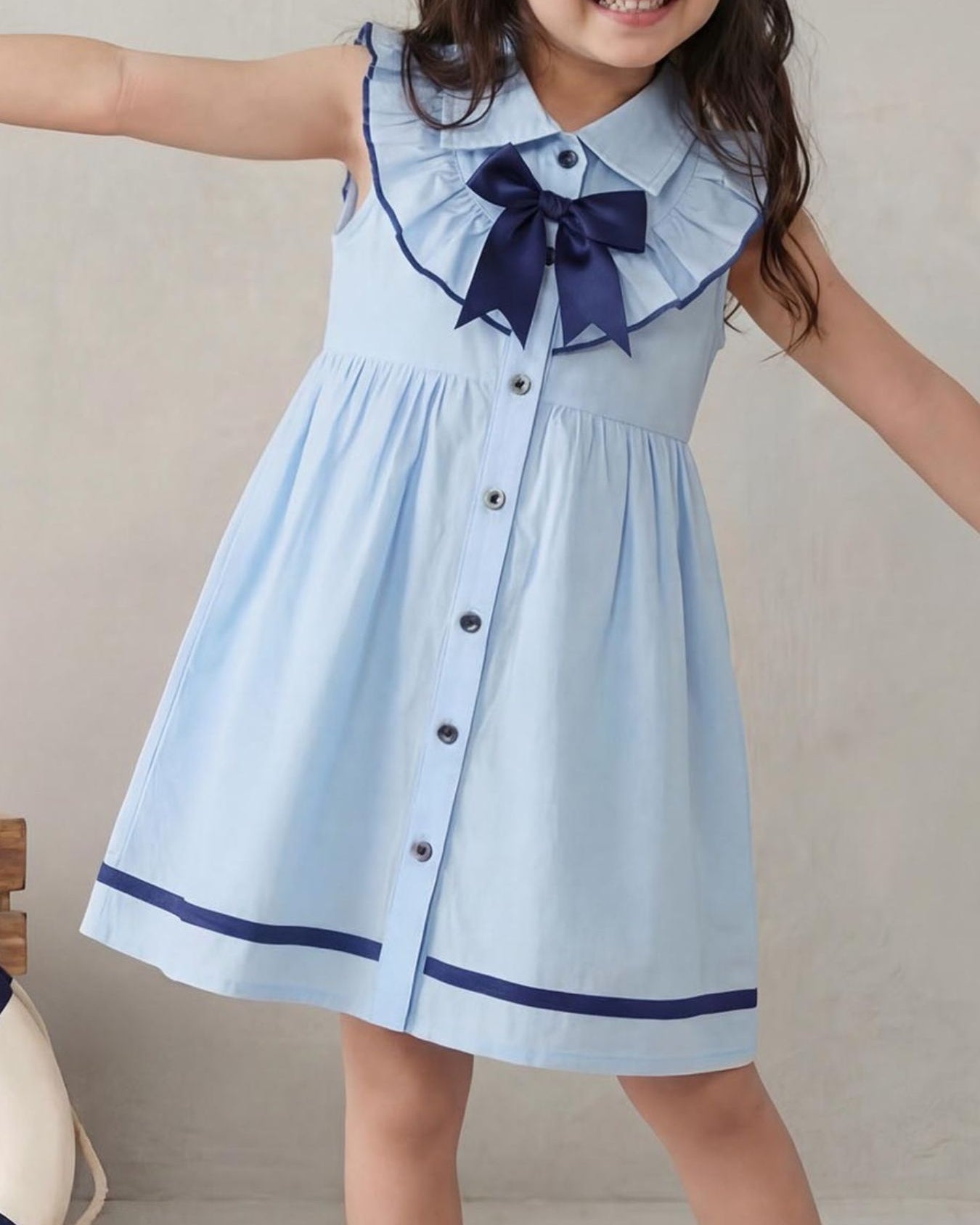Sky blue kids bow collar dress with button front and gathered skirt, front model view