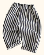 Striped kids elastic waist tapered trousers with front pockets and rolled cuffs, front view