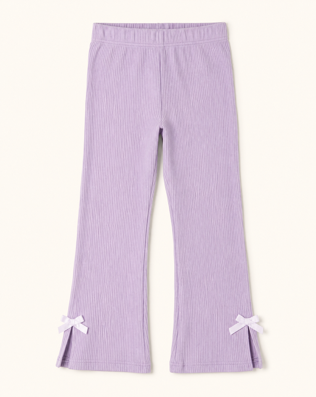 Lavender ribbed kids flared pants with elastic waist, side slits and white bows, front view