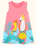 Blush pink kids tropical parrot print sleeveless dress with colorful birds and foliage, front product view