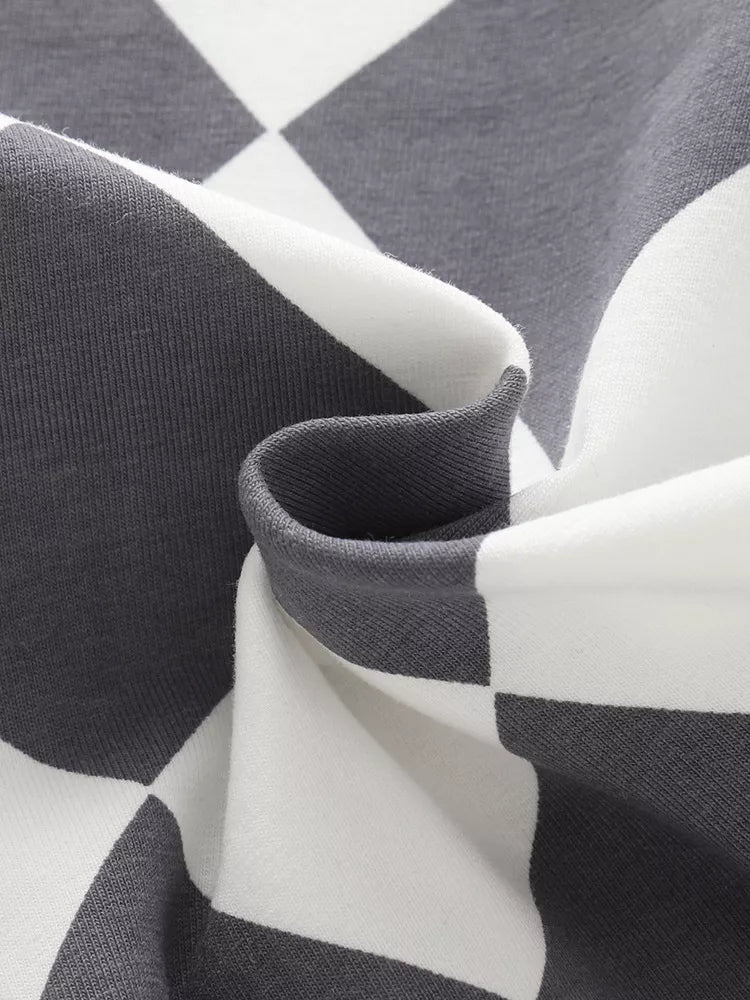 Black-and-white kids diamond print shorts fabric, material close-up