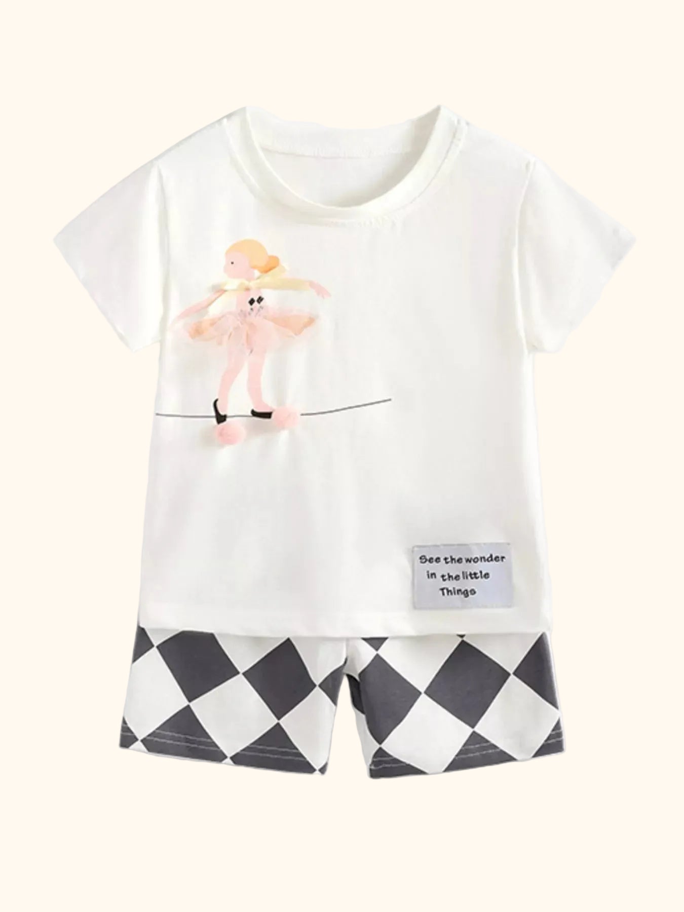 White kids ballet dancer appliqué T-shirt and black-and-white diamond shorts set, front product view
