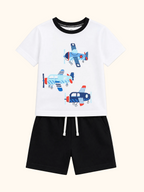 White kids airplane graphic T-shirt and black shorts set, front product view