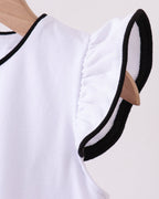 White kids flutter sleeve with black contrast edging, close-up detail view