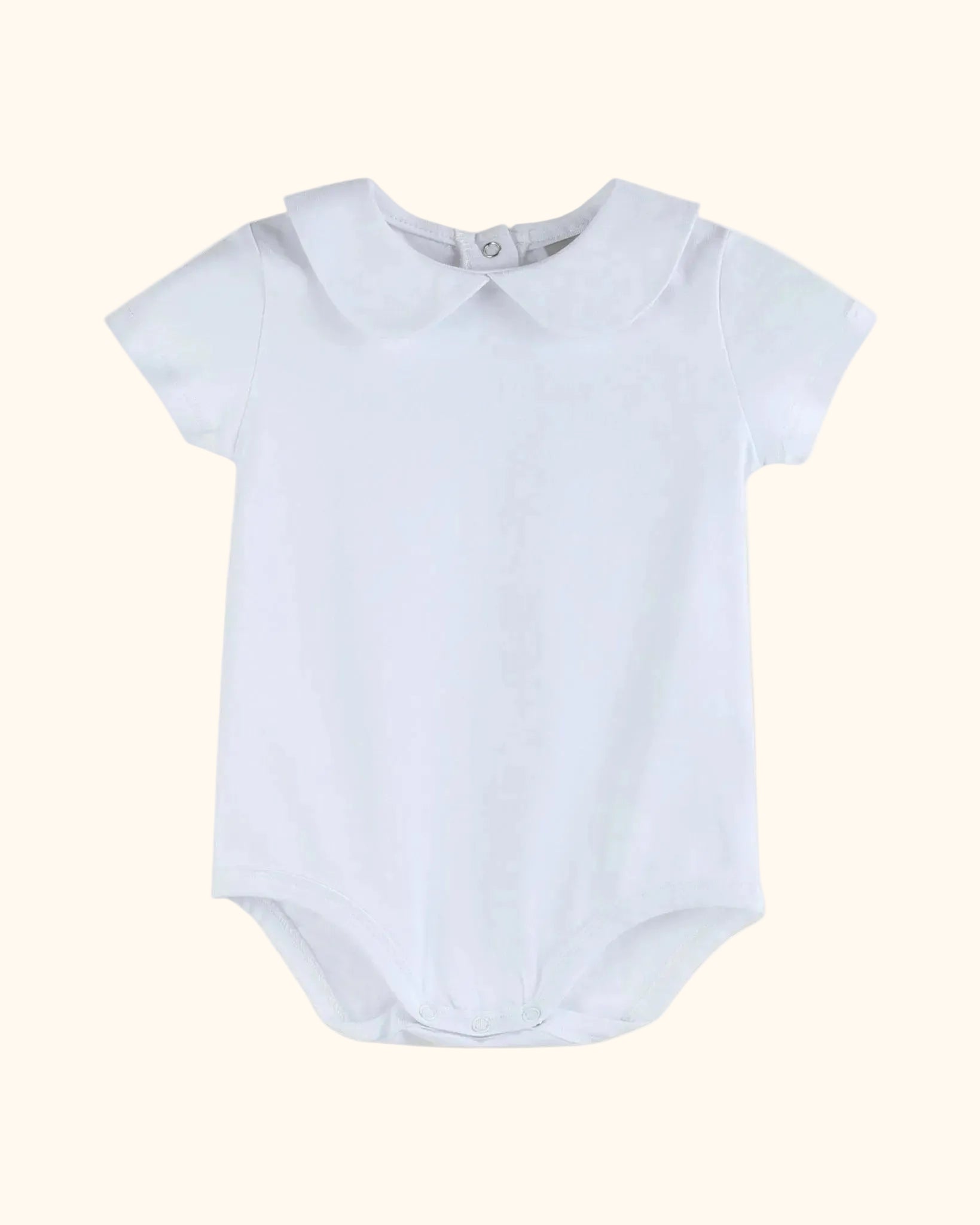White organic cotton baby bodysuit with Peter Pan collar and short sleeves, front view
