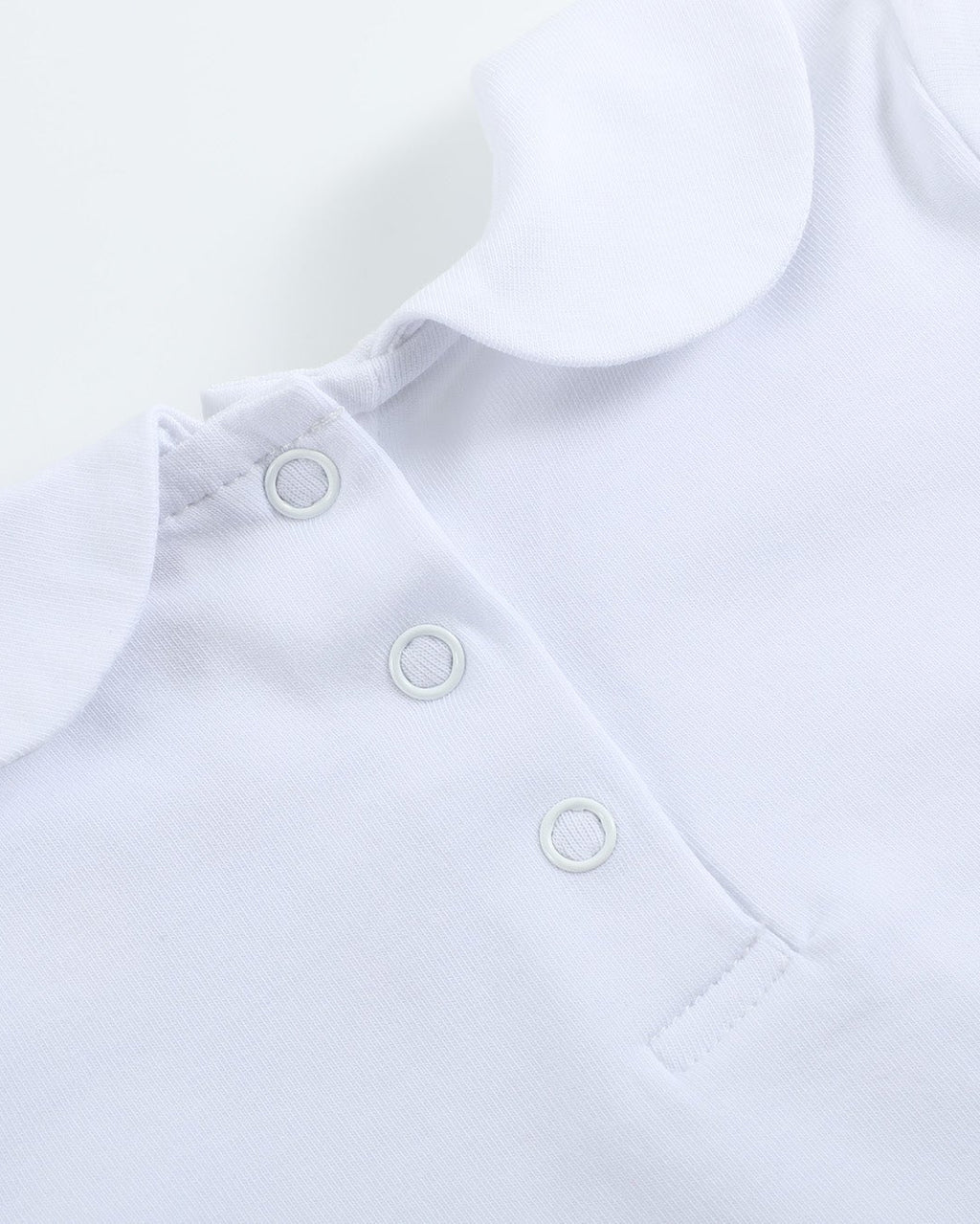 White Peter Pan collar baby bodysuit with three-snap back placket, close-up detail
