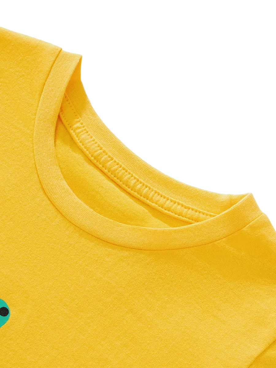 Yellow kids crocodile graphic T-shirt with round neckline, neckline close-up