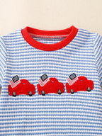 Light blue striped baby tee with three red car motifs and flag details, front close-up