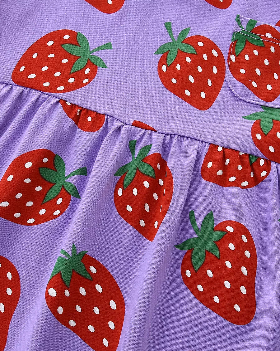 Purple kids strawberry print dress with gathered waist seam, close-up detail view