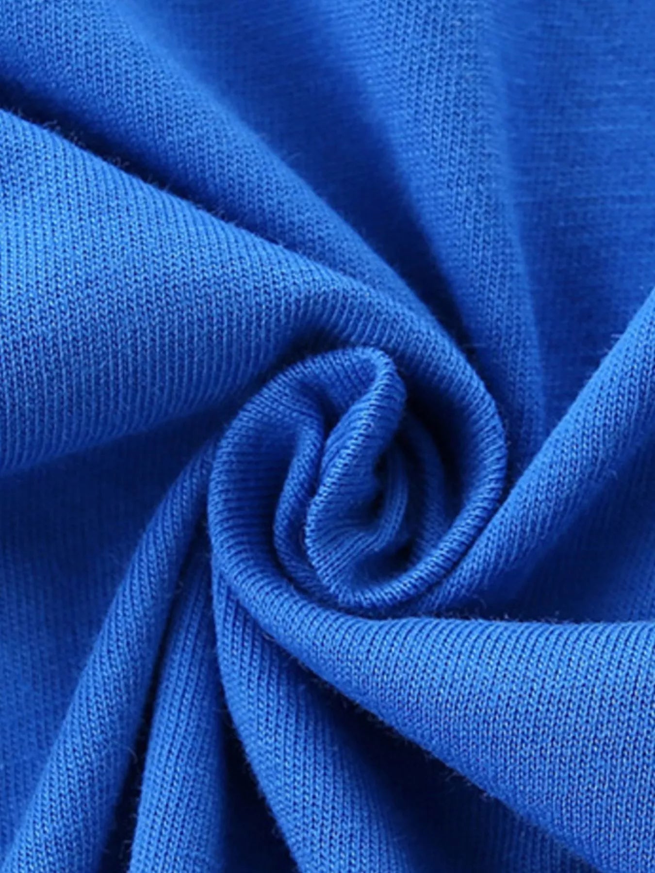 Blue kids T-shirt cotton-blend fabric, close-up texture view