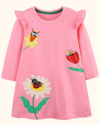 Blush pink kids insect and flower appliqué long-sleeve dress with ruffled shoulders, front product view